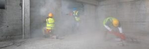 Construction worker in dusty environment highlighting glasses clarity issues LASIK for tradespeople Sydney