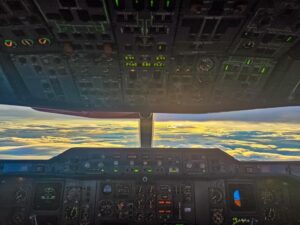 Pilot scanning between cockpit instruments and outside horizon, demonstrating need for stable vision and laser vision correction