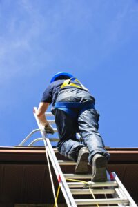 Tradie working on roof ladder demonstrating benefits of LASIK for tradespeople Sydney stable vision.